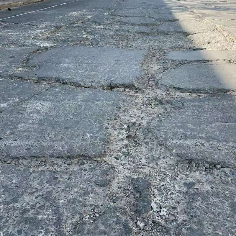 虎林路面起砂露石子修补料